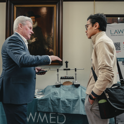 People chatting at a conference